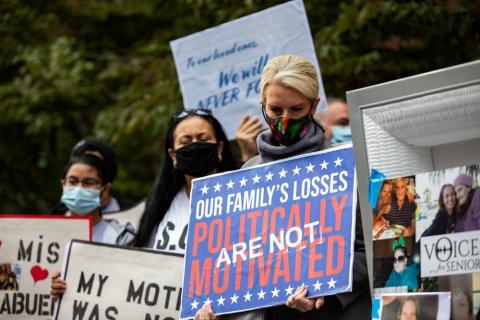 Grieving family members hold a mock funeral in the Brooklyn borough of New York City Oct. 18 to protest Gov. Andrew Cuomo's coronavirus restrictions that they say led to the deaths of their loved ones in nursing homes.