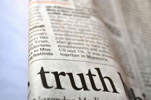 Newspaper that says "truth"