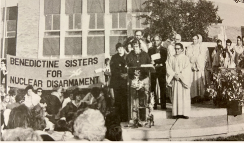 Mary Lou preaches at outdoor Mass, circa 1990